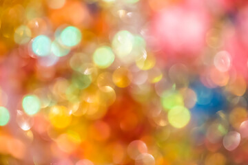 Blurred glowing spots create a golden bokeh effect perfect for joyful holiday and celebratory visual design