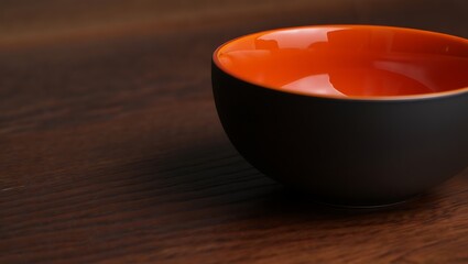 Elegant Black and Orange Bowl A Modern Kitchen Essential