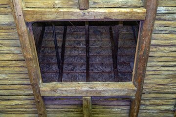 Hole in the ceiling of an old barn