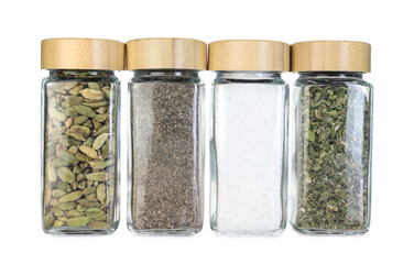 Many different aromatic spices in jars isolated on white