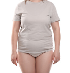 Weight loss. Plus size woman on white background, closeup