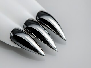 Closeup of Three Chrome Nails on White Background