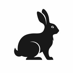 Black silhouette of a sitting rabbit on a white background, simple vector illustration