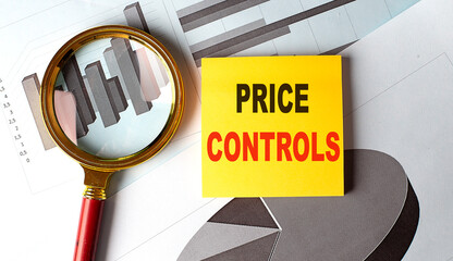 Price controls text on yellow paper with magnifying glass and economic charts