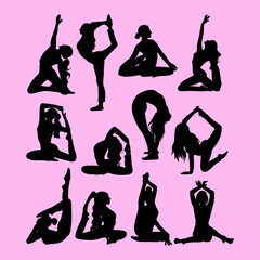 silhouettes of women doing yoga
