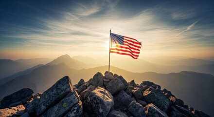 American Flag Waving on Rocky Mountain Peak at Golden Sunrise