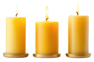Three lit yellow candles isolated on transparent background