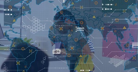 Girl lifting tablet, typing on laptop while boy watching as network graphics signaling tech shift - Powered by Adobe