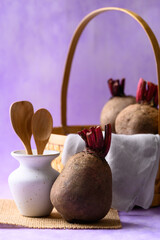Fresh beetroot on purple background, Imperfectly shape