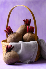 Fresh beetroot in basket on purple background, Organic vegetable