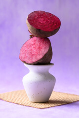 Fresh beetroot on purple background, Still life