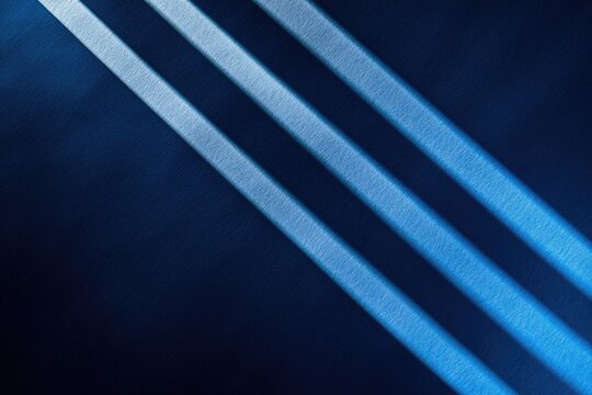 Dark blue background with three diagonal light beams