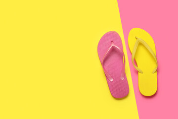 Composition with stylish flip-flops on color background