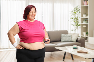 Woman with diabetes using insulin pen
