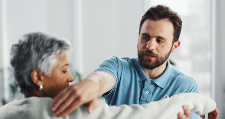 Shoulder, stretching and physiotherapy with man in office for consulting, healthcare and...