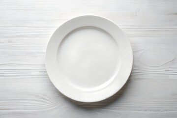 Empty white plate on wooden table in bright minimal background