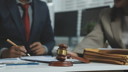 Lawyer businessman working with lawbook in office or courtroom Legal counsel with gavel and legal law. justice and lawyer concept Judge gavel hammer on Lawyer desk - Powered by Adobe