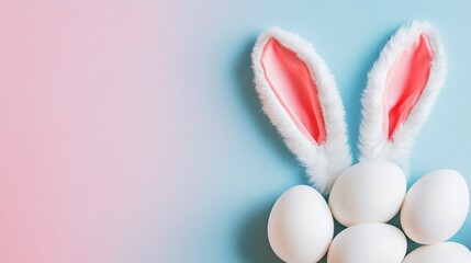easter bunny ears white eggs on isolated pastel background with copyspace