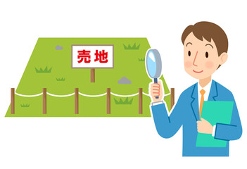土地の調査をする不動産業者　売地　空地　資産