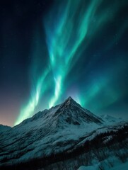 Majestic mountains under a vibrant aurora borealis.