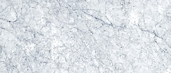 Obraz premium Close-up of a light gray stone surface with a network of thin, irregular veins creating a textured pattern