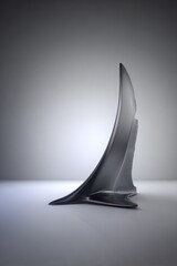 Fototapeta premium Abstract sculpted form, metallic gray, modern design
