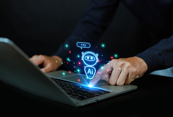 Man using laptop to chat with AI Chatbot Assistant or Artificial Intelligence Technology, Hologram Robot Application and Global Connectivity