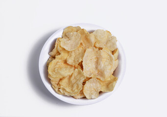 Deep-fried Emping, a type of Indonesian chip made from melinjo nuts, has a slightly bitter taste and is often served as a snack or accompaniment to Indonesian dishes.