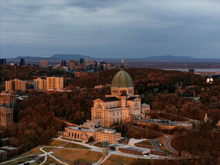 Aerial view of St. Josephs Oratory of Mount Royal at Sunset in winter. Montreal, Quebec, Canada