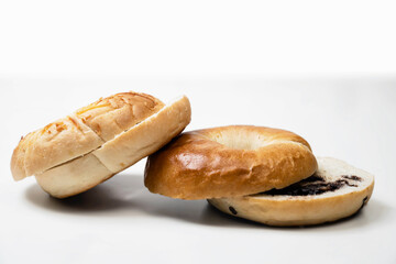 Closeup view of slices of bagel bread isolated over a white background