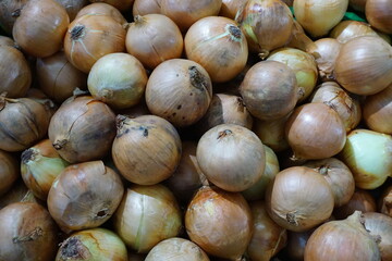 anpile of onion in the basket