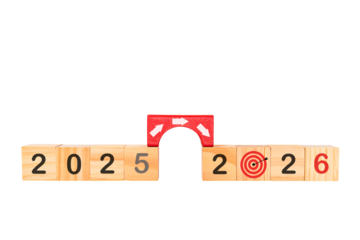Transition years 2025 to 2026 on wooden blocks with copy space. To prepare for the new year changes and start thinking about strategies and new business goals.PNG