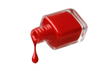 Red nail polish dripping from an open bottle, isolated on a transparent background, ready for beauty and fashion projects