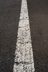 rough white line paint on roads