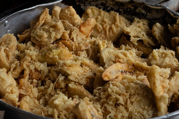 Crispy Fried Banana Fritters in a Large Pot
