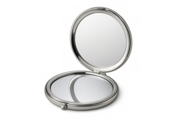 Polished silver pocket mirror reflecting light, exhibiting sleek circular shape against transparent surface, emphasizing compact styling