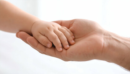 Tender Moments A Child's Hand in an Adult's Palm