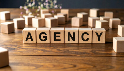 Agency Wooden Block Letters on Rustic Tabletop