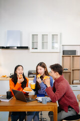 Teamwork and creativity with young adults collaborating on laptops and tablets