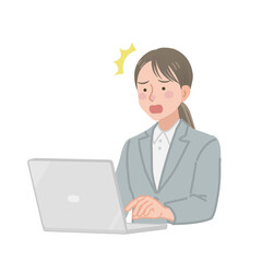 PC画面を見て驚くビジネスウーマン