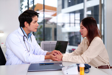 Doctor's Gentle Support: A caring doctor provides comfort and reassurance to a patient during a medical consultation, showcasing empathy and trust in healthcare setting.