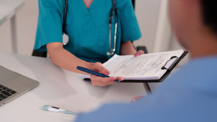 Asian Woman Doctor Explaining Medical Report to Patient in Clinic Consulting Healthcare Treatment Professional Consultation for Examination Checkup