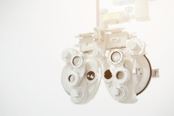 key in keyhole, Phoropter for eye test, lenses glasses for eye check in optical store, health care, eye care concept, industry eye care 