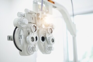 Phoropter for eye test, lenses glasses for eye check in optical store, health care, eye care concept, industry eye care, electrical outlet on the wall, 