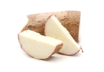 Cassava or Manioc Root, Isolated. Two Cassava or manioc root tubers, edible starchy tuberous roots when dried is called tapioca.