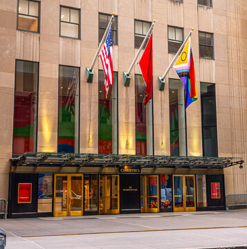 Christie's auction house facade in Rockefeller Centre with the pride flag. NYC, New York State, United States of America, 4 June.