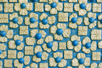 a beautiful flower and square pattern in blue and white for backgrounds and design