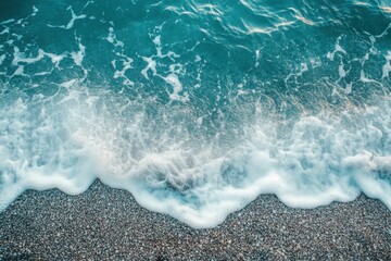 Peaceful waves gently lap at the shore creating a serene coastal landscape during daylight, Tranquility and serenity nature background Wave on sea coast beach