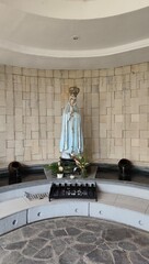 The statue of the Virgin Mary is a symbol of the Catholic religion, a place of meditation to get closer to God