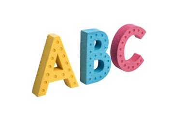 Colorful foam letters A B C in yellow blue pink displaying alphabet learning toys, isolated on a transparent background